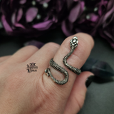 Silver Snake Ring being worn on a finger.